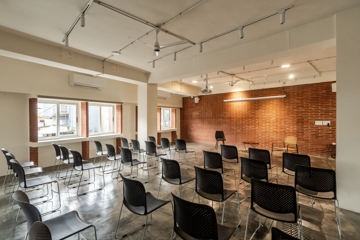 Chairs arranged for a gathering at Samagata Space.